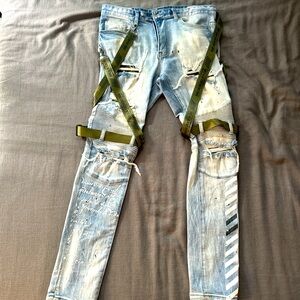 Distressed Light Blue Jeans with Green Straps